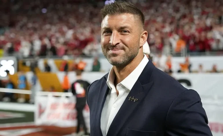 Tim Tebow Autographs Taxidermied Alligator at Fanatics Fest