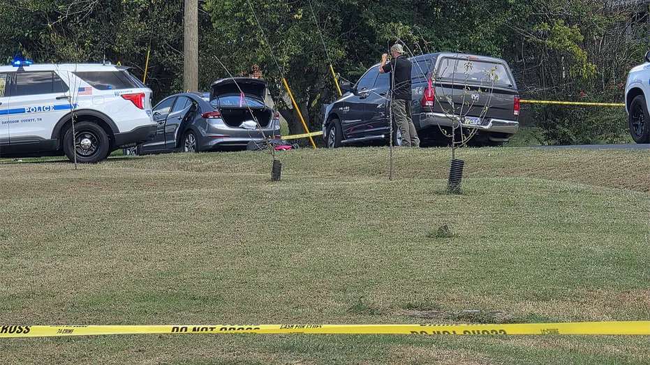 Man Killed by Police After Woman Found Trapped in Car